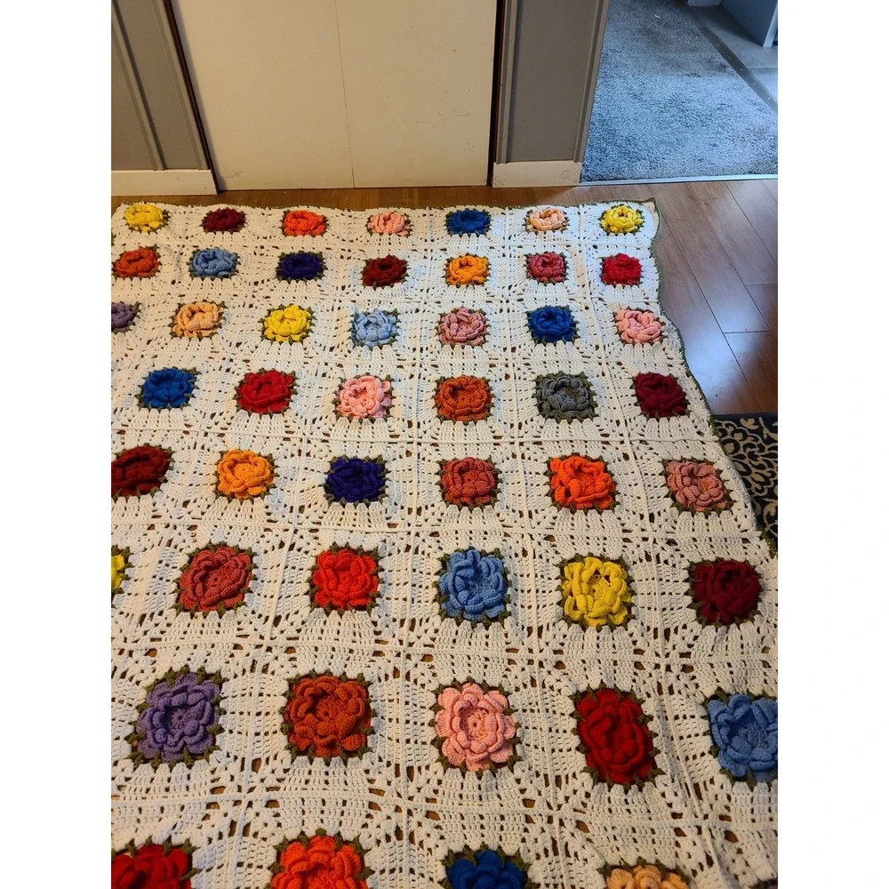 Handmade Vintage Crochet Afghan Colorful 3D Rose Motifs on a White Background